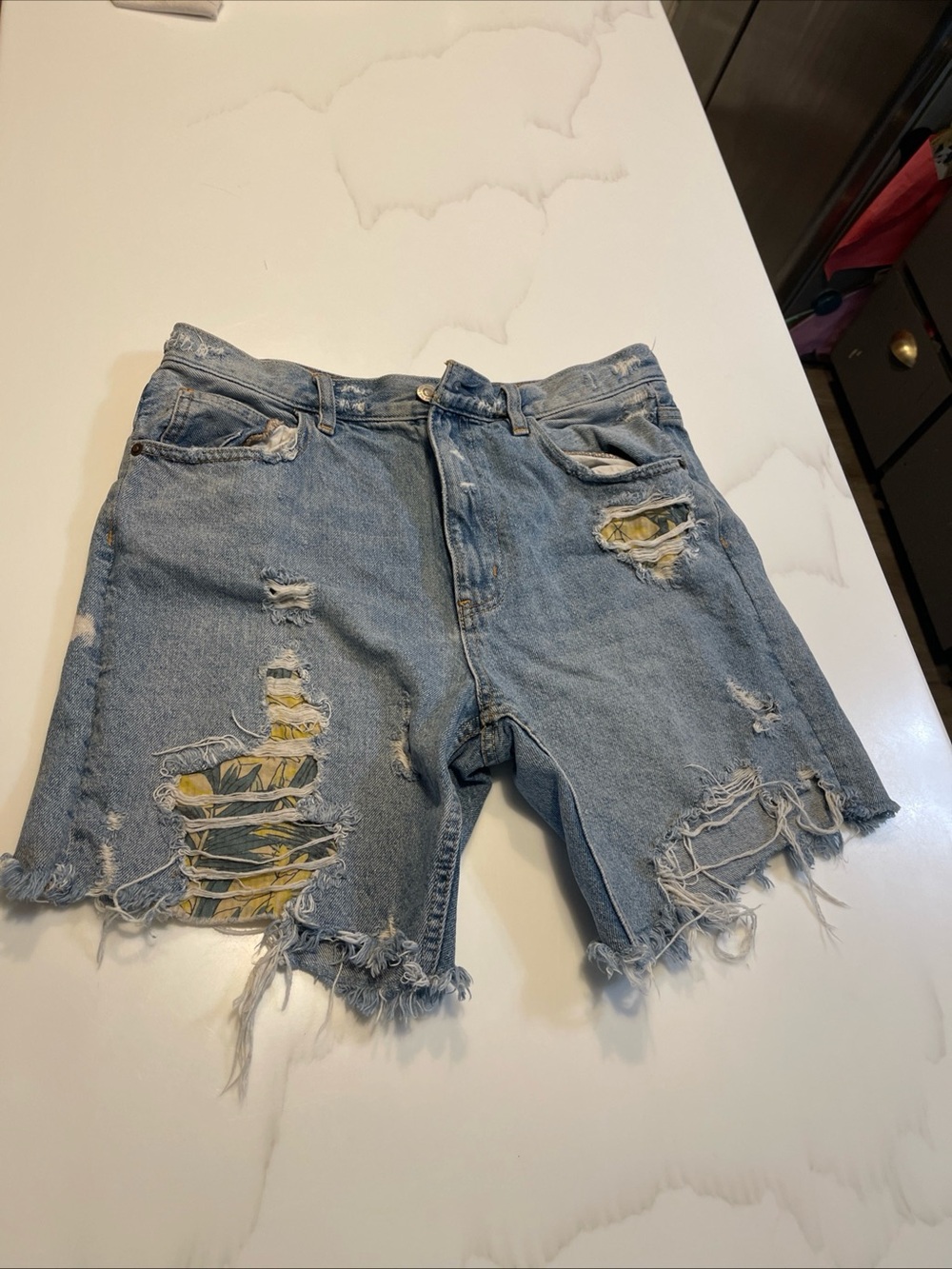 We The Free Light Blue Distressed Denim Shorts with Yellow Patch Details